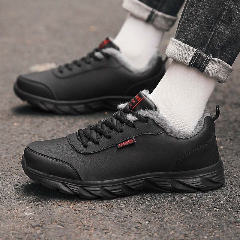 Men's black lace-up winter sneakers with plush collar and chunky rubber outsole.