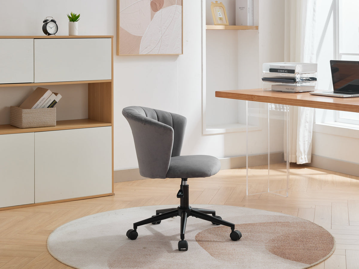 Grey velvet swivel office chair with curved back and black five-star base