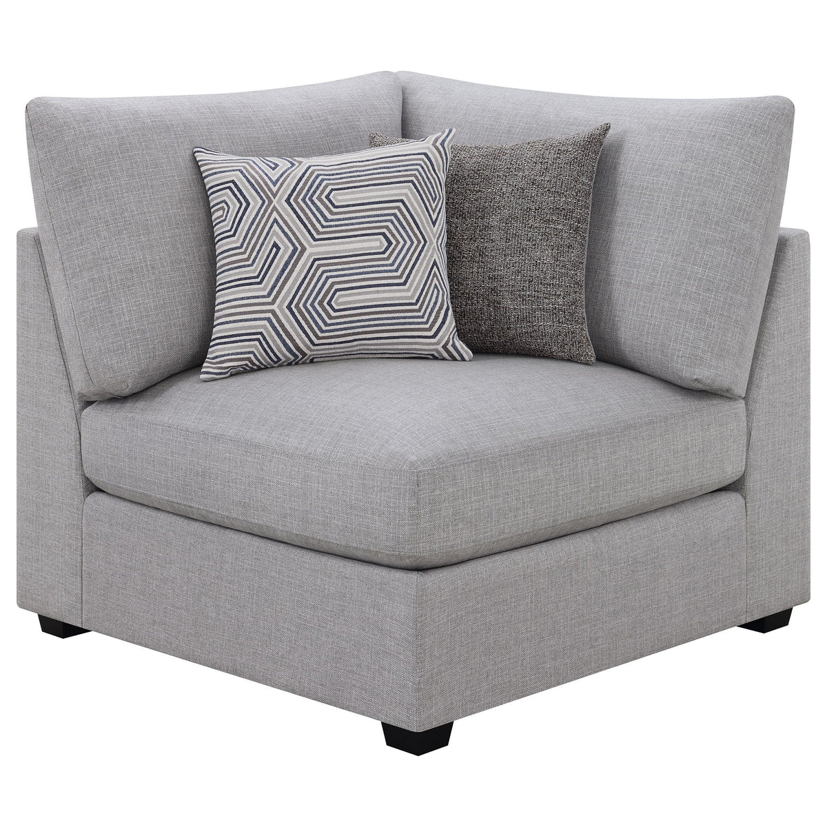 Grey upholstered chaise-style sectional end with patterned and solid throw pillows