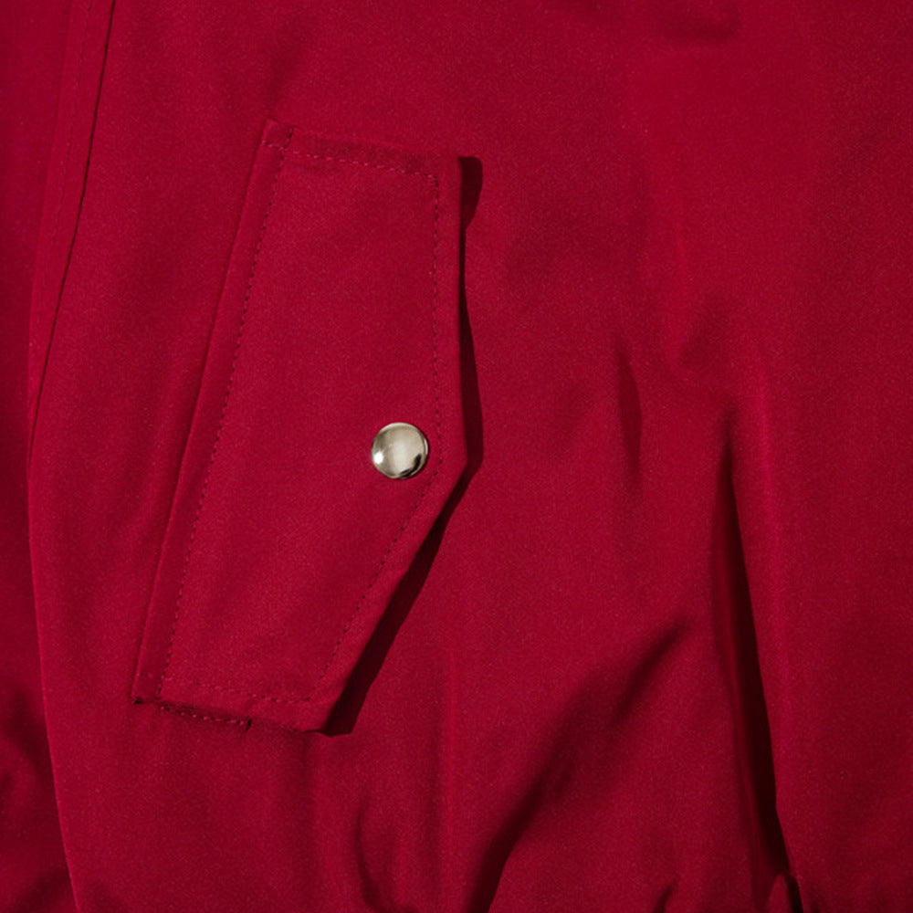 Red jacket coat close-up: flap pocket with metal snap button