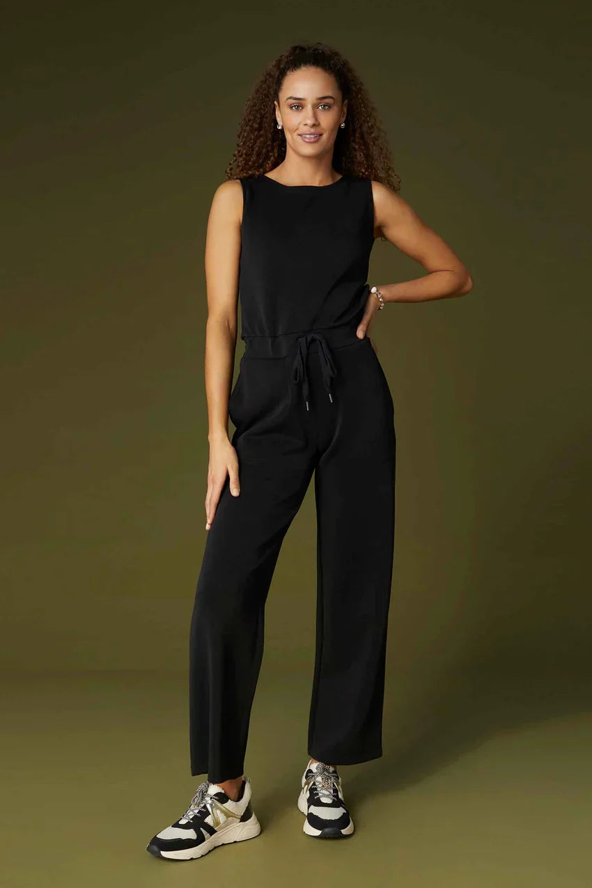 Black sleeveless romper with drawstring waist and side pockets, wide legs