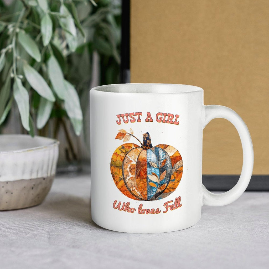 White ceramic mug with handle, pumpkin graphic and 'Who loves Fall' text
