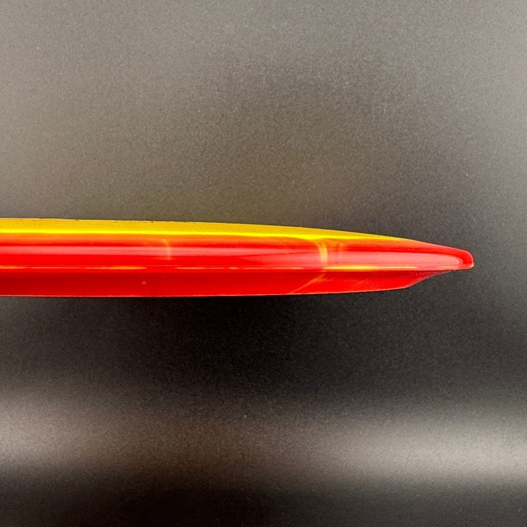Orange-red disc golf driver side profile