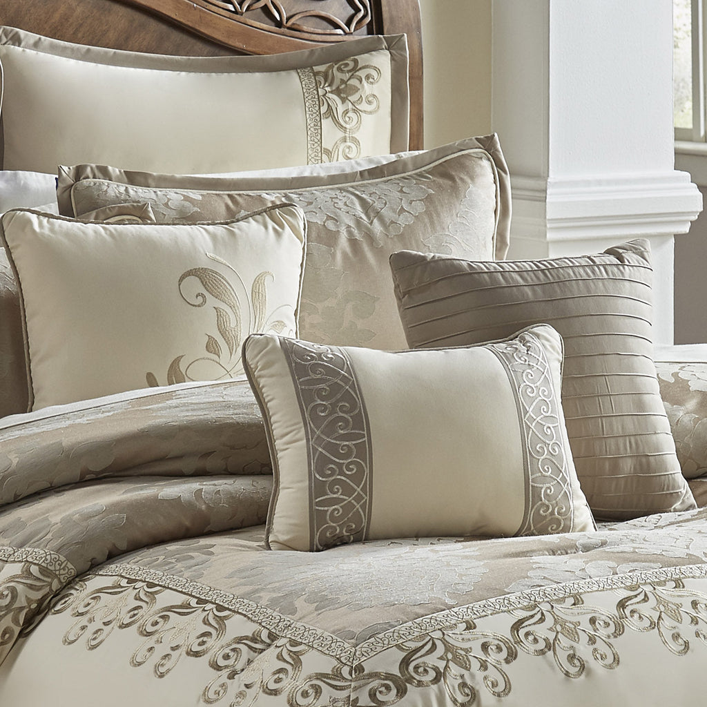 Ivory comforter ensemble with jacquard texture and embroidered accent pillows