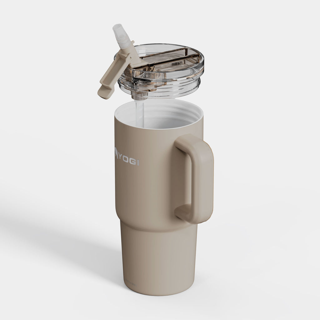 Ceramic-lined tumbler with open clear lid and straw tube, side handle
