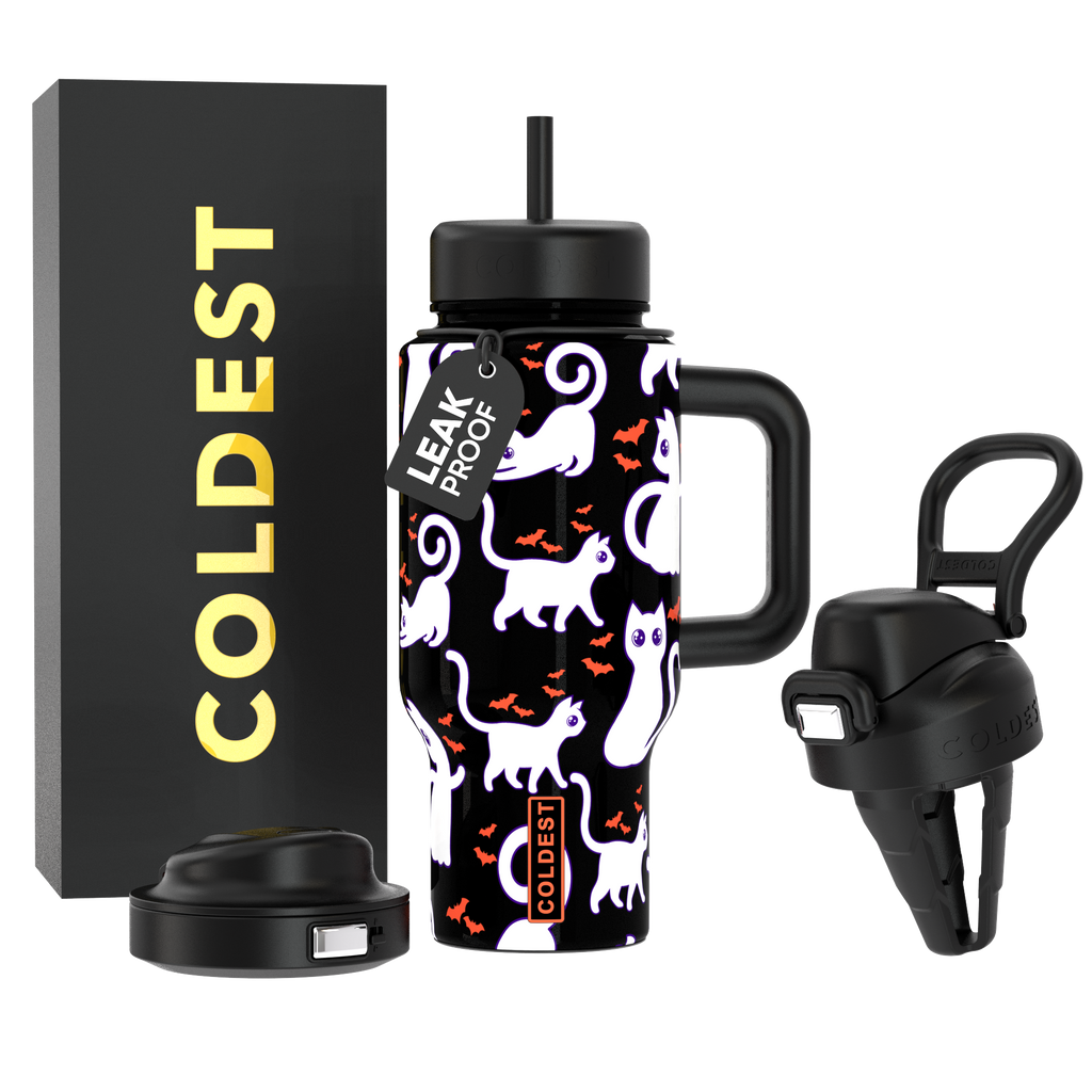 24oz insulated tumbler with straw lid, black with white cat pattern, handle sleeve