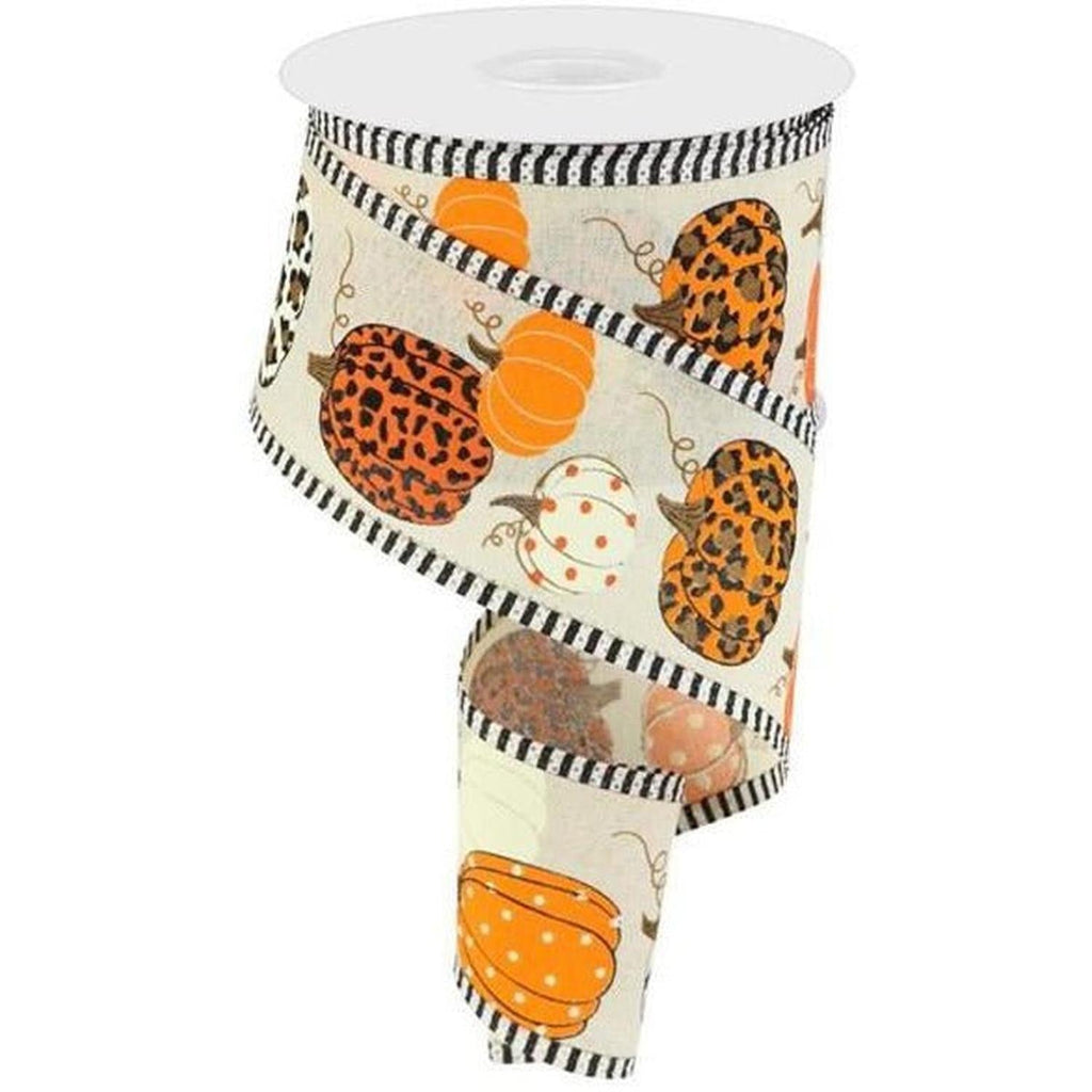 Cream ribbon spool with leopard pumpkin prints and black-and-white striped edge.