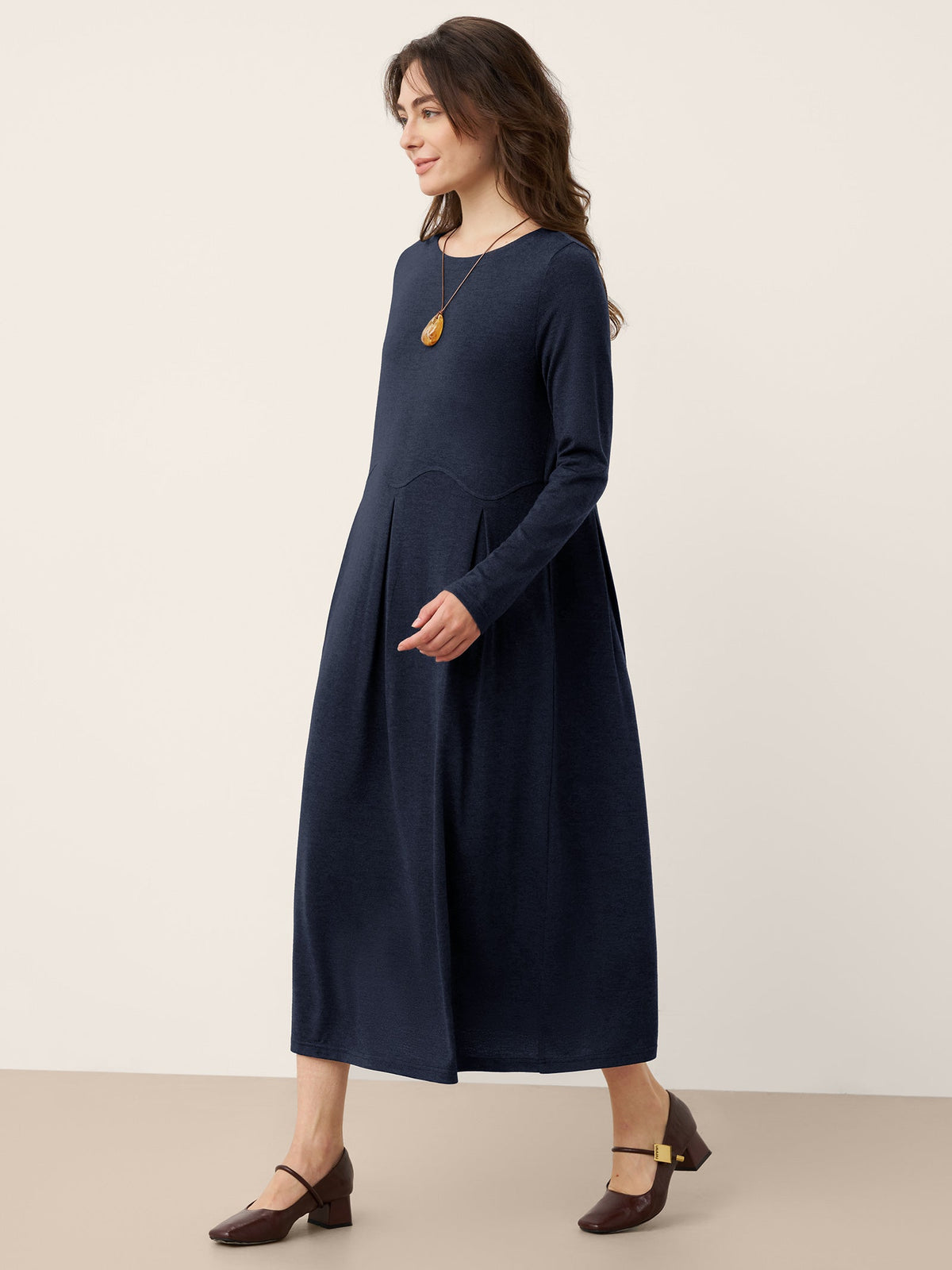 CALISTA navy wool midi dress with sculpted pleats and long sleeves