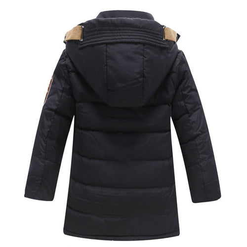 Kids winter puffer jacket in black, back view with attached hood and quilted insulation