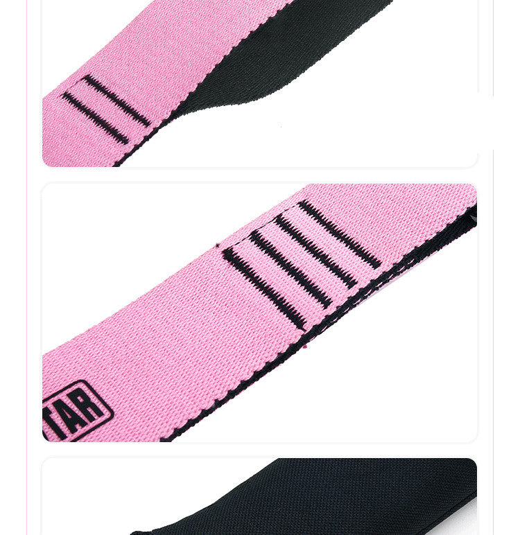 Pink yoga stretch band with black striped detailing and stitched edge