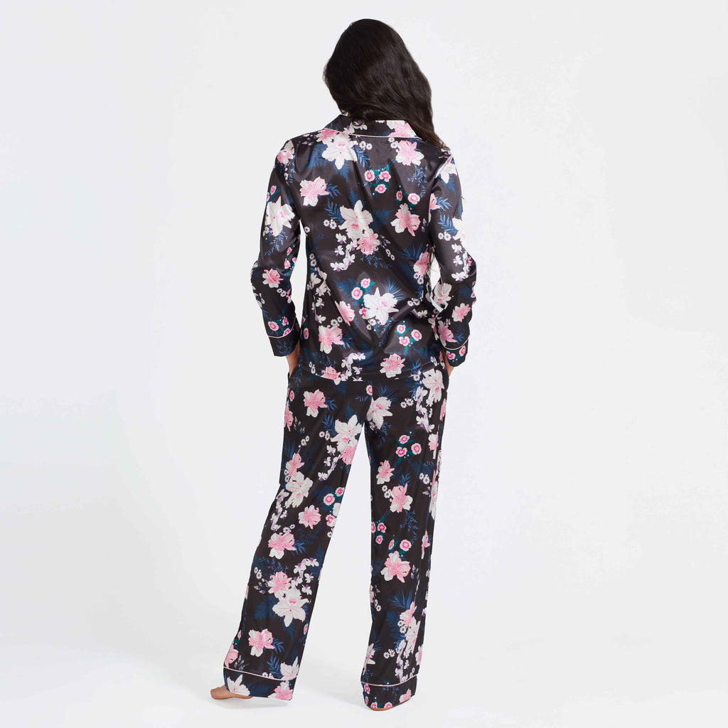 Black floral satin pajama set back view with long sleeves and straight pants
