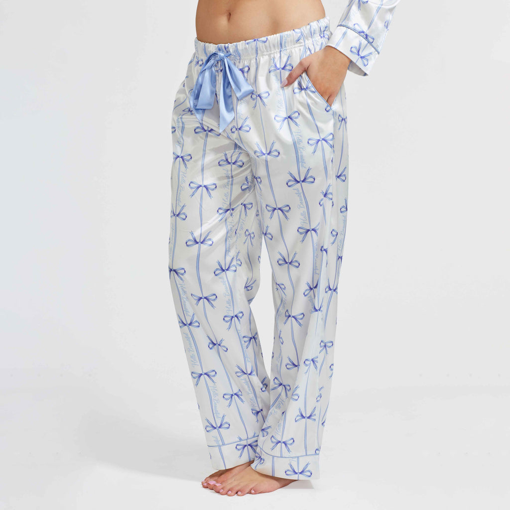 Blue bow-pattern satin pajama pants with elastic waist and drawstring tie