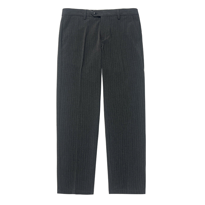 Slim-fit gray trousers flat lay with belt loops and button waist closure