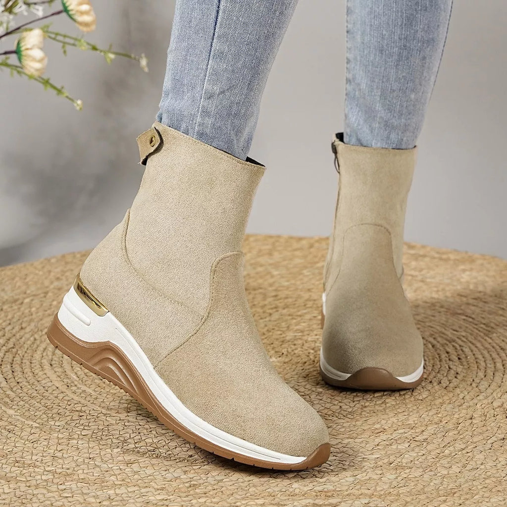 Beige suede ankle boots with wedge heel, elastic panel and side zipper