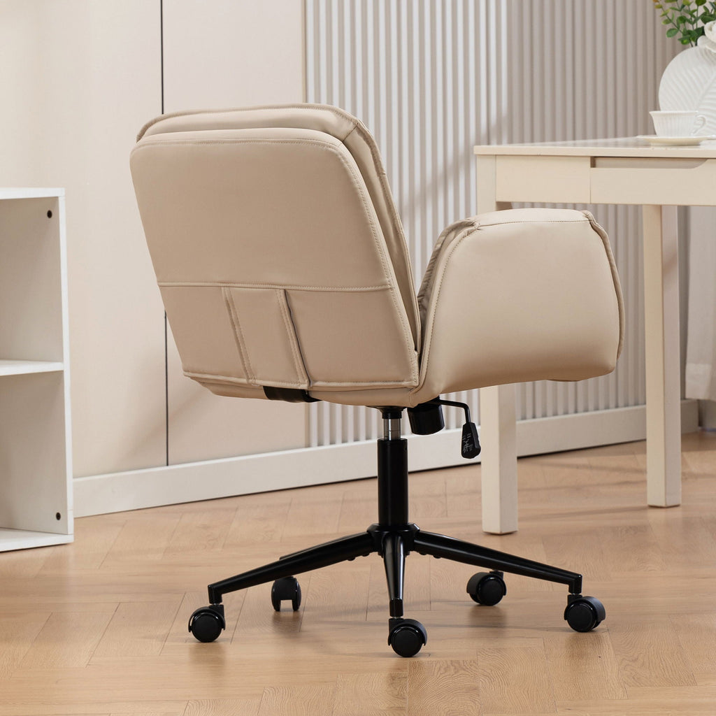Beige faux leather swivel chair with padded armrests, high back, and rolling casters
