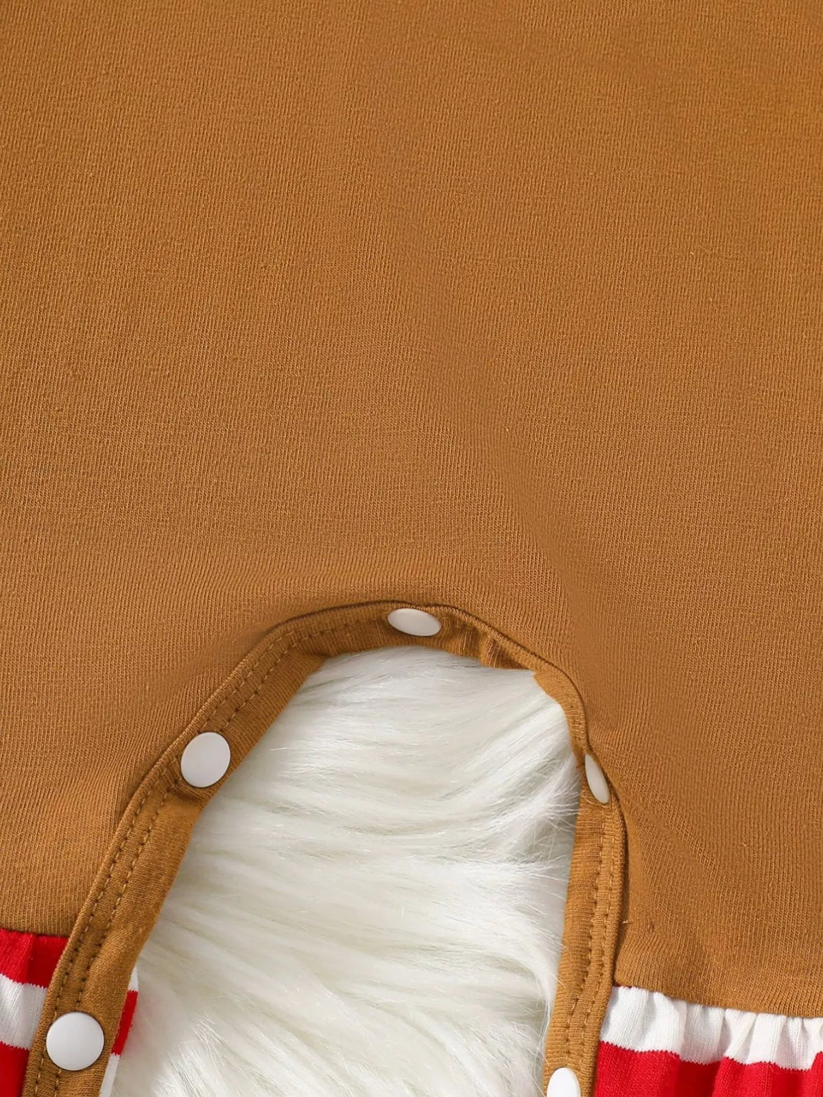 Caramel jumpsuit with white plush cuff and snap closure at leg opening