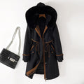 Black mid-length padded winter coat with faux-fur hood and drawstring waist
