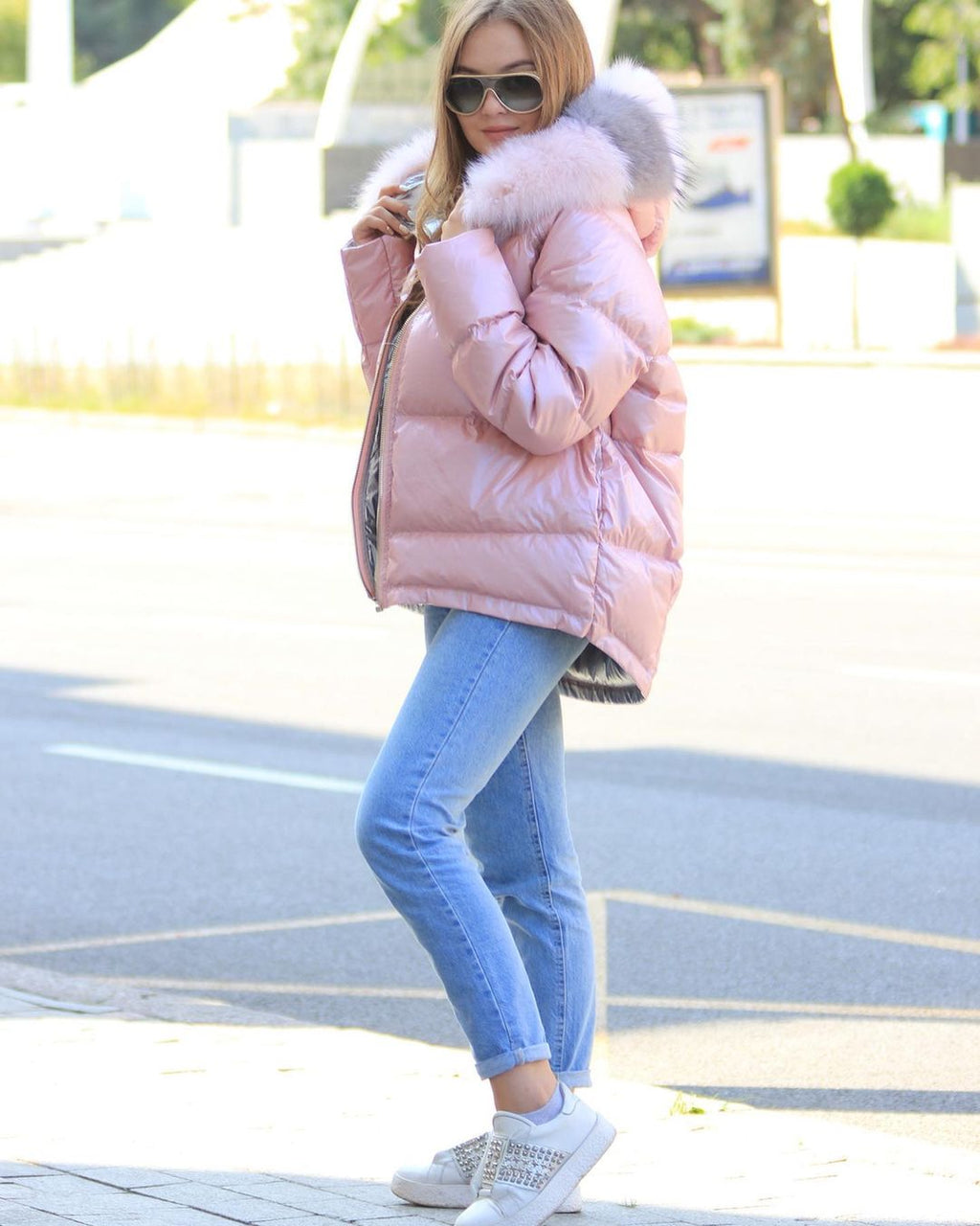 Pale pink reversible down coat with faux fur hood trim and quilted diamond stitching