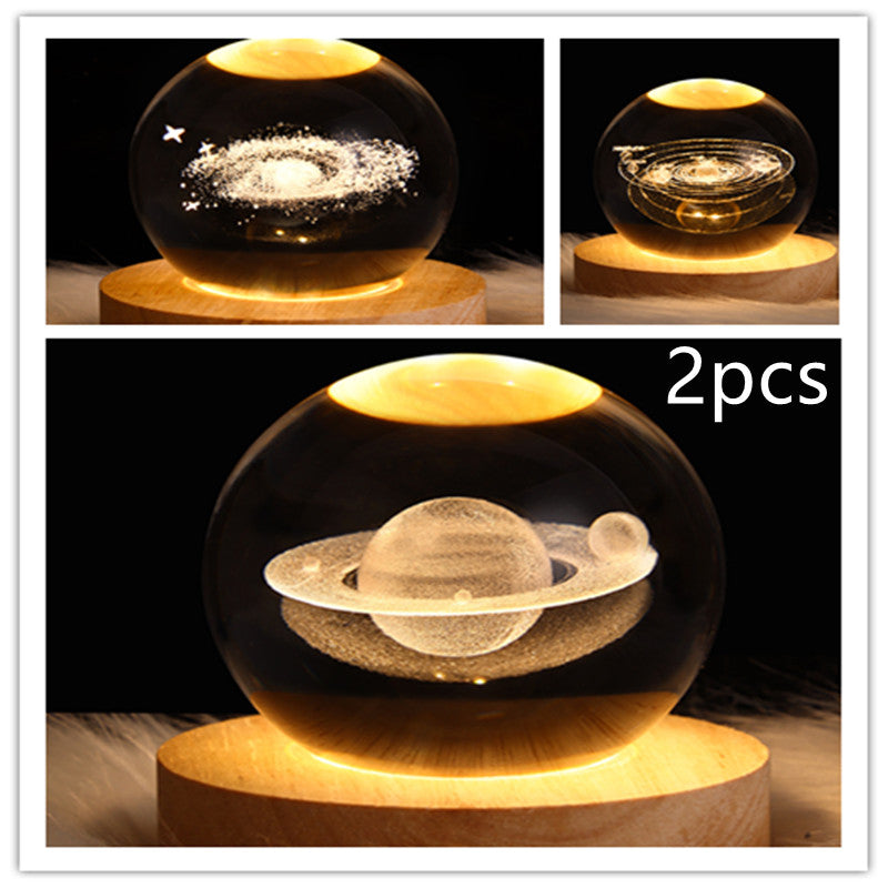 LED galaxy crystal ball lamp with star-dust glow and circular ring patterns; wooden base