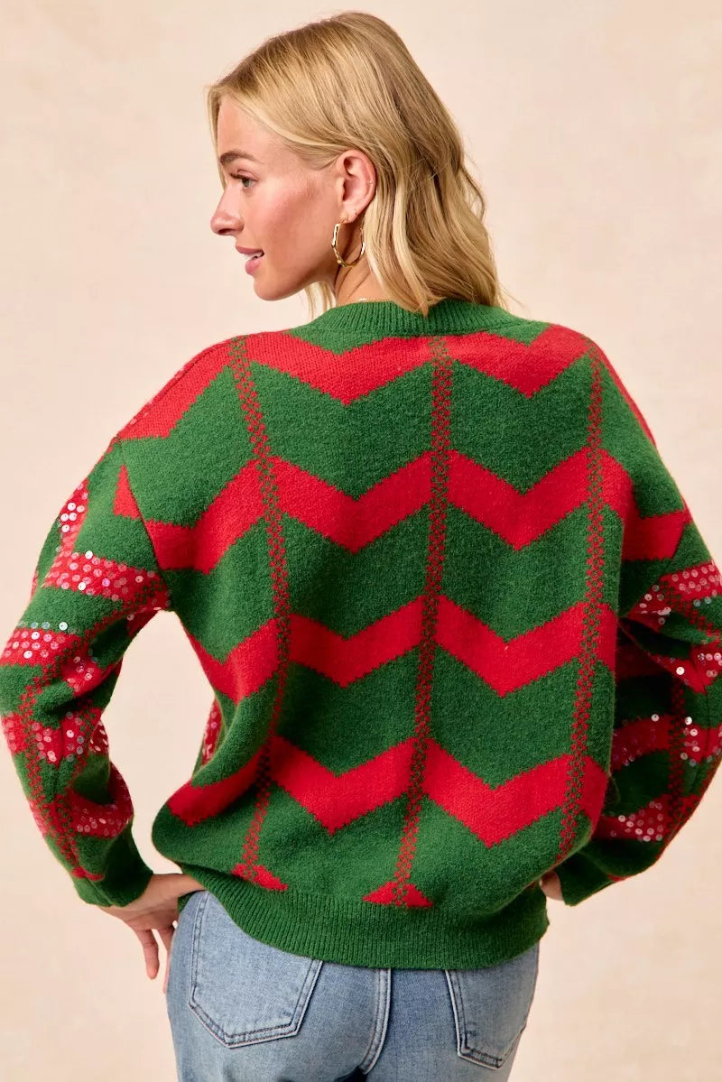Green chevron knit sweater with red sequin zigzag pattern, back view