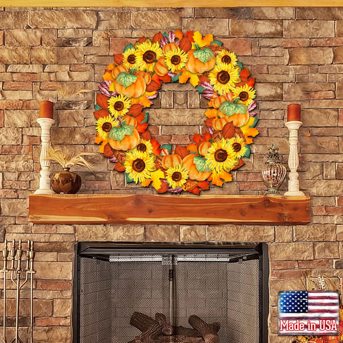 Circular door wreath with pumpkins and sunflower blooms