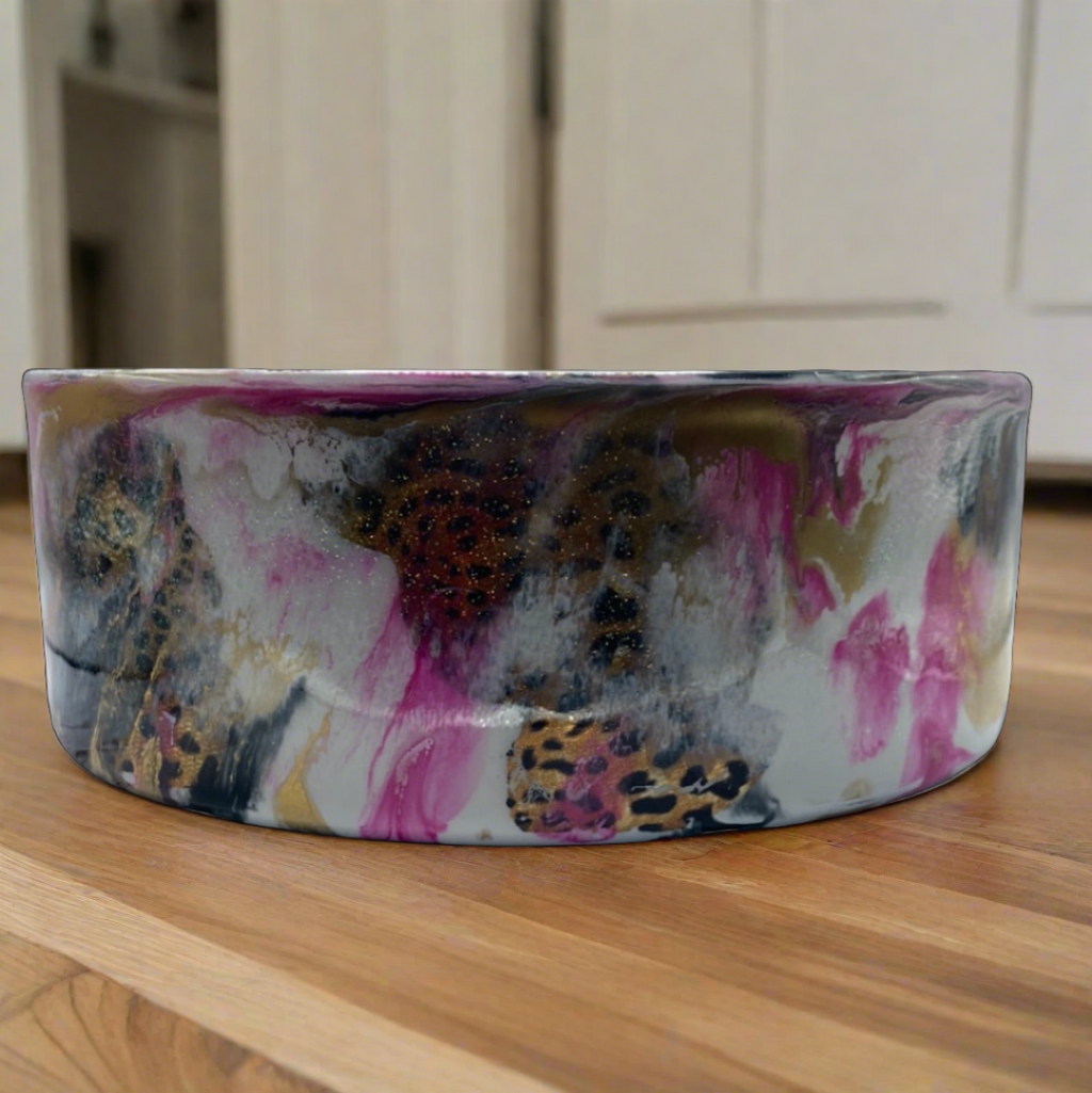 Hand-painted stainless steel dog bowl with pink and black cheetah pattern