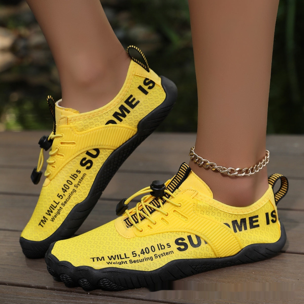 Yellow lace-up water shoe with thick sole and ankle chain strap