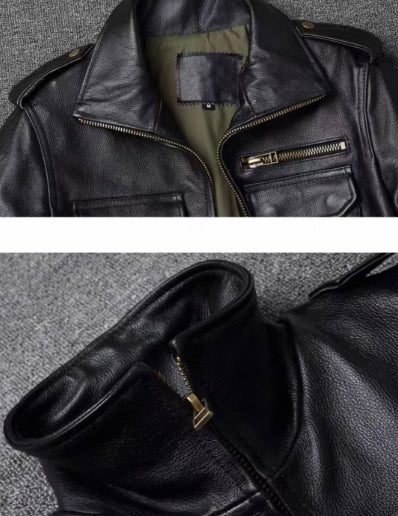 Men's leather work jacket close-up: zip front, stand collar, chest pockets