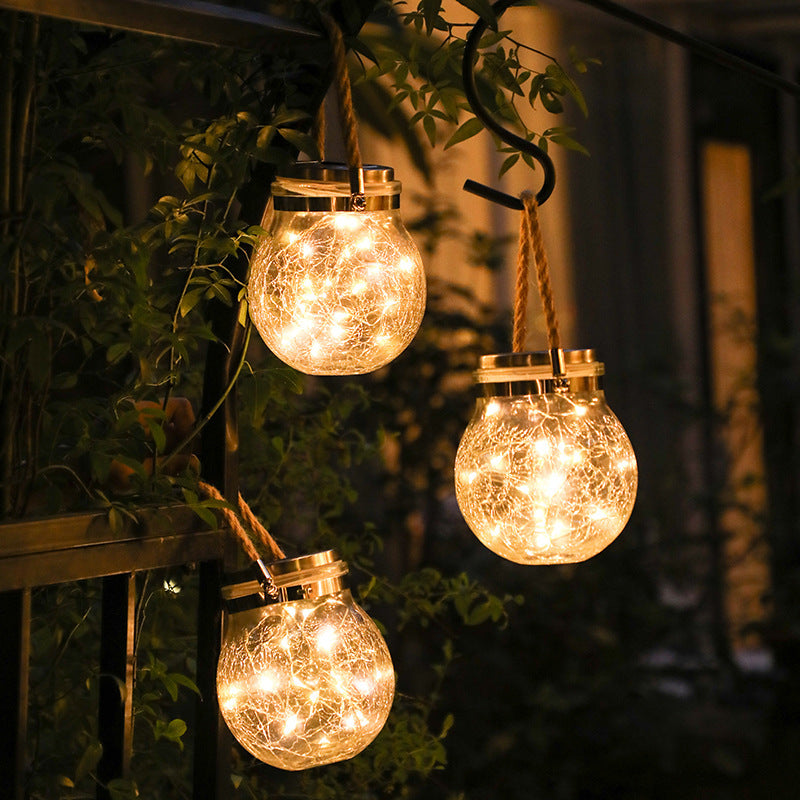 Crackle glass jar globe string light with gold cap, warm glow