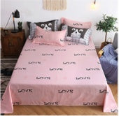 Cat-print bed duvet set with pink panels and two matching accent pillows