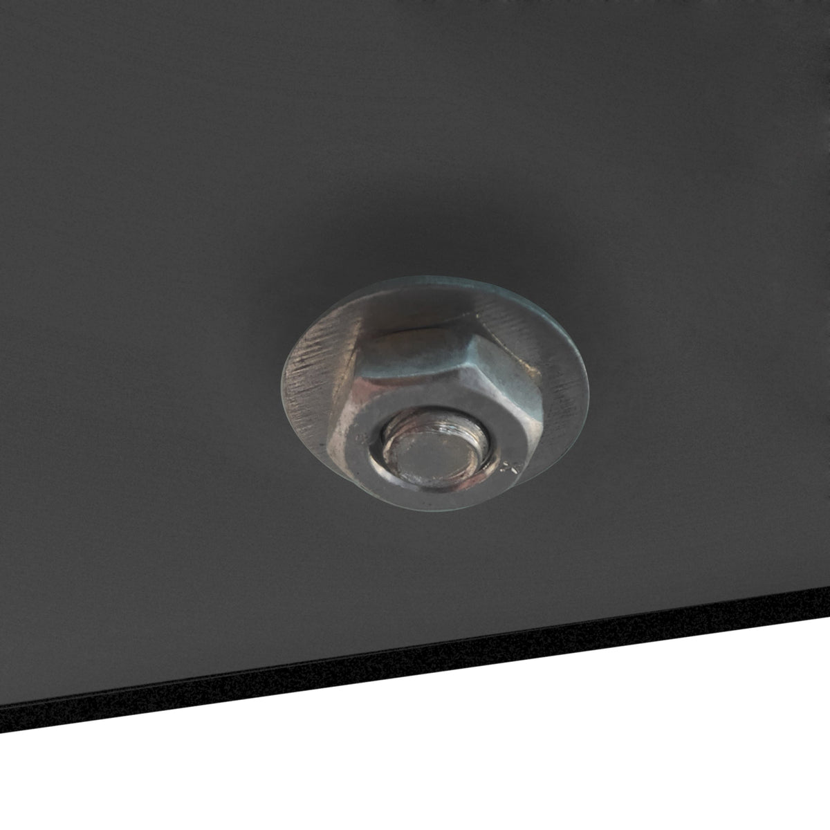 Black glass coffee table surface with circular metal support fitting