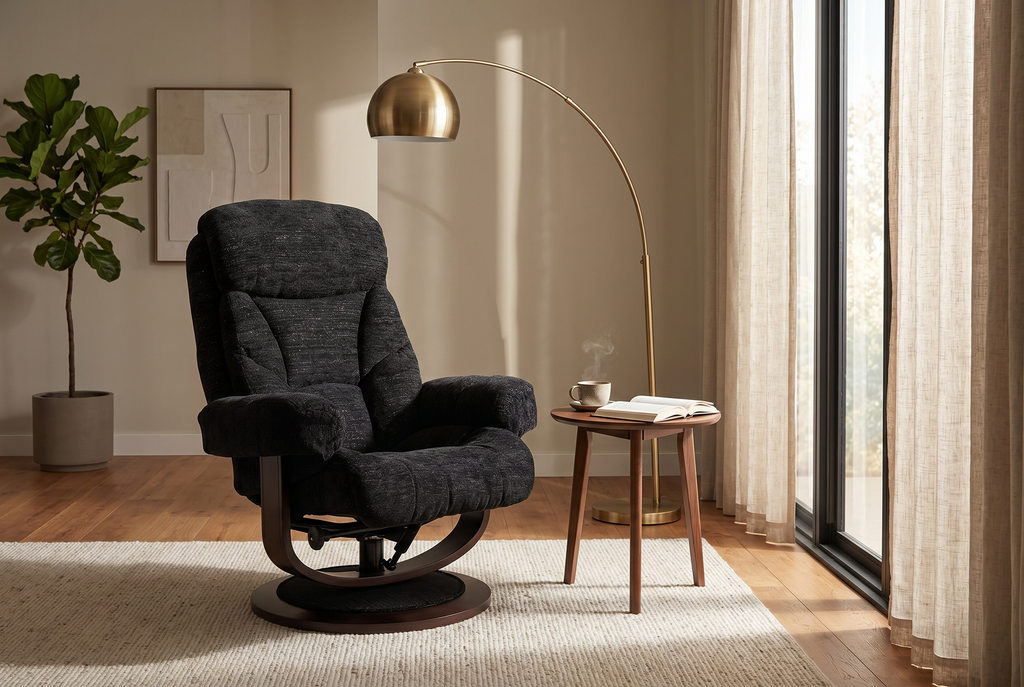 Dark fabric recliner chair, side view with padded armrests and round base