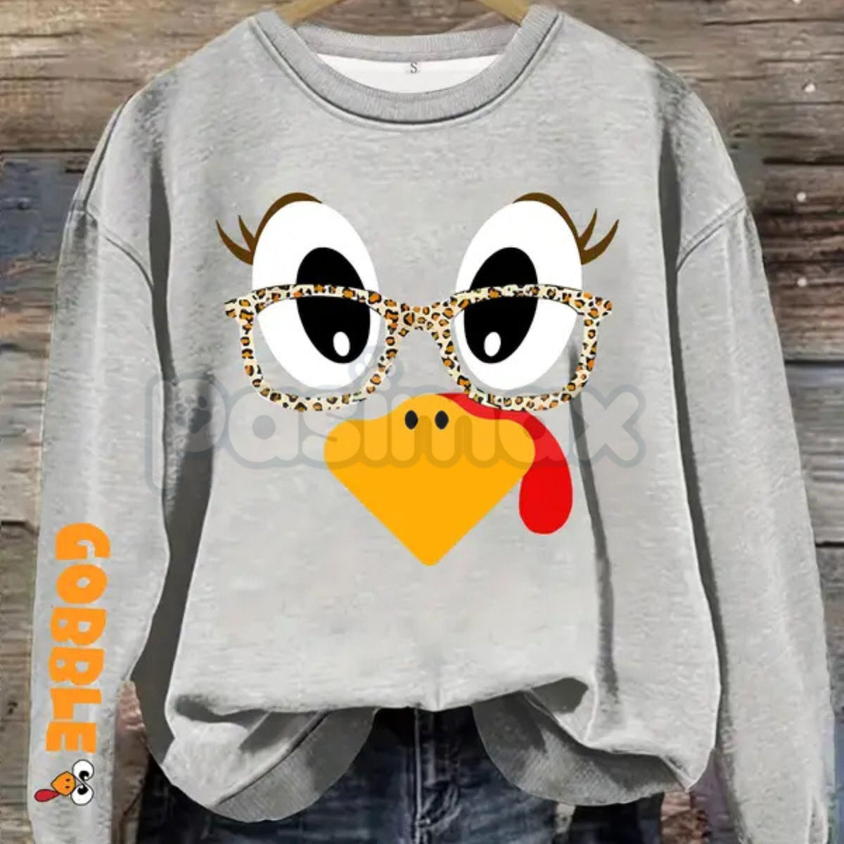Gray women's crewneck pullover sweater with cartoon turkey face and glasses print
