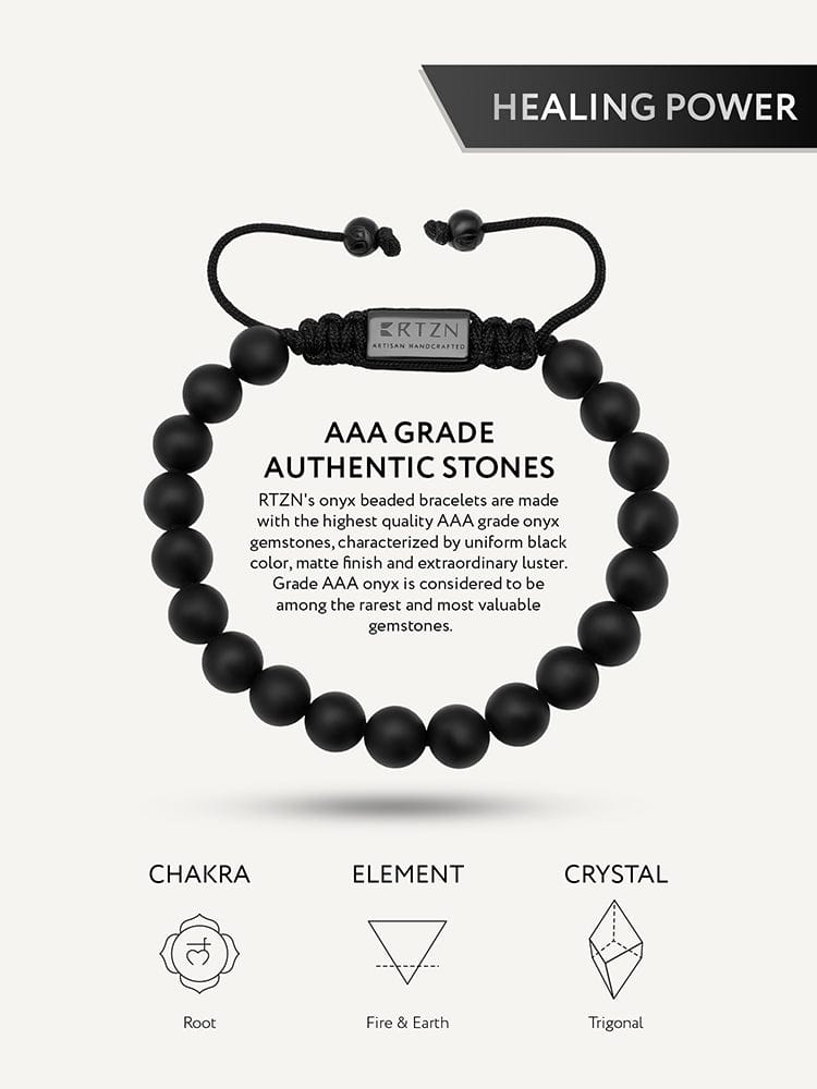Black onyx beaded bracelet laid flat with central rectangular label