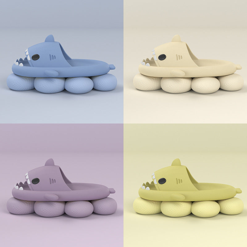 Shark-shaped slide sandals in blue and cream, open toe with white tooth details