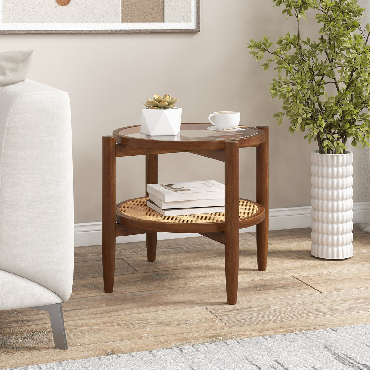Round rattan side table with clear glass top and lower round woven shelf, dark wood frame