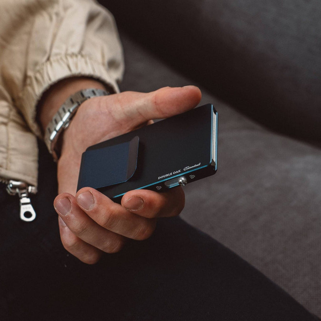 Blue pop-up cardholder with a card partially popped out for quick access.