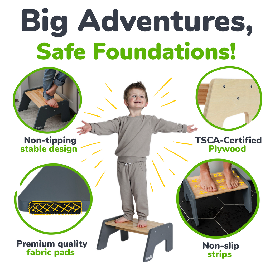 Gray kid step stool with child standing, showing non-slip fabric pads and strips