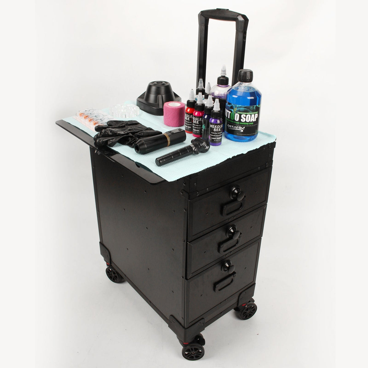 Black rolling tattoo supply suitcase with open work surface and bottle organizer