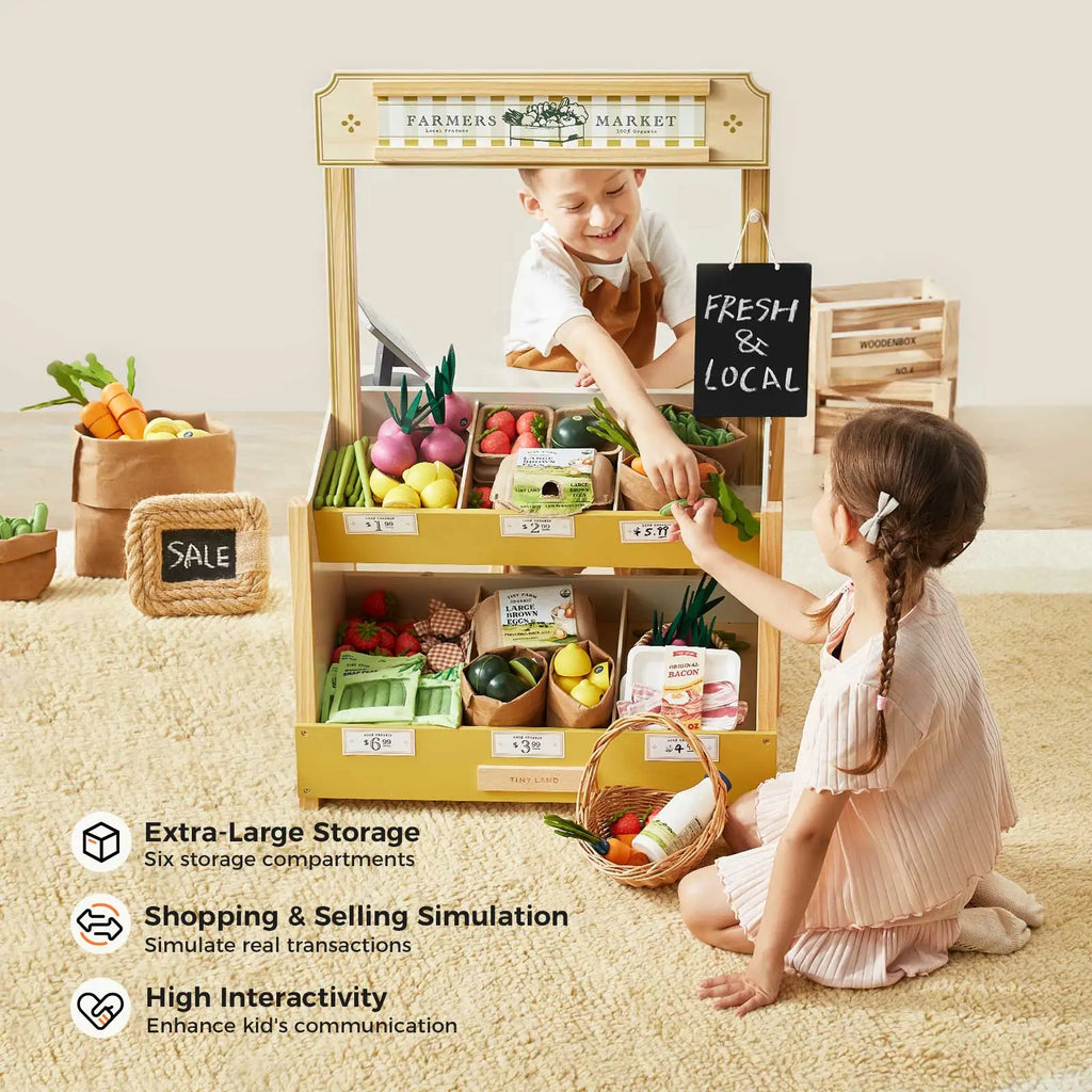 Tiny Land® kids grocery store playset with open front shelves and a child playing