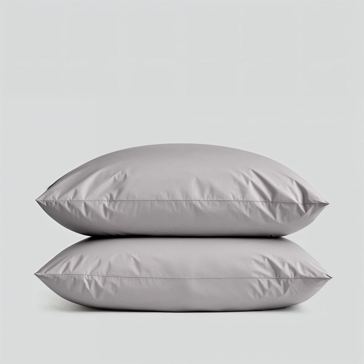 Sateen bedding set with two pillows in light gray color