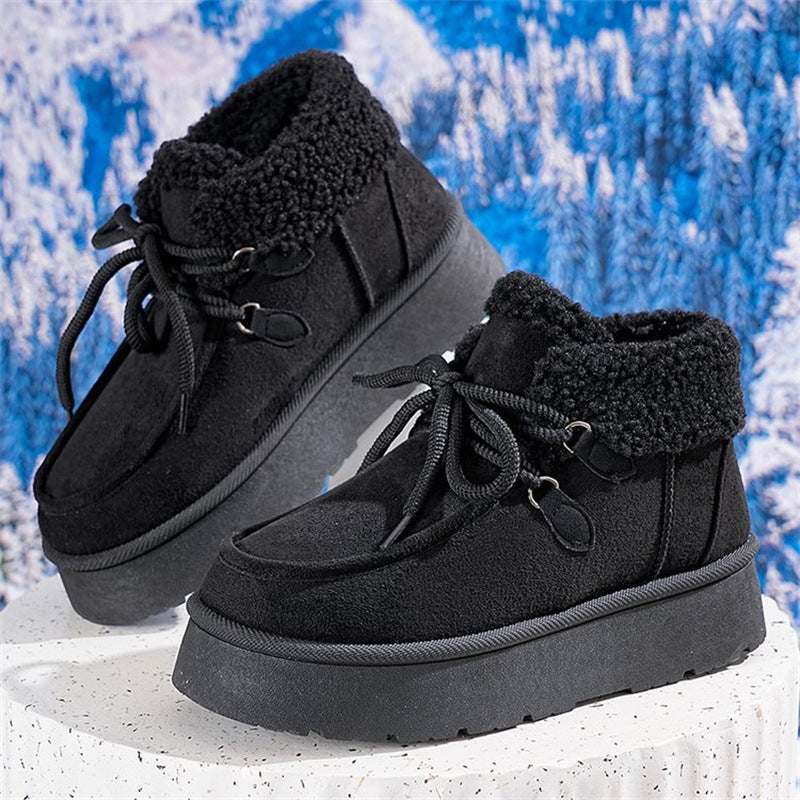 Fleece-lined black snow boots with lace-up closure, sherpa lining, thick cushioned sole
