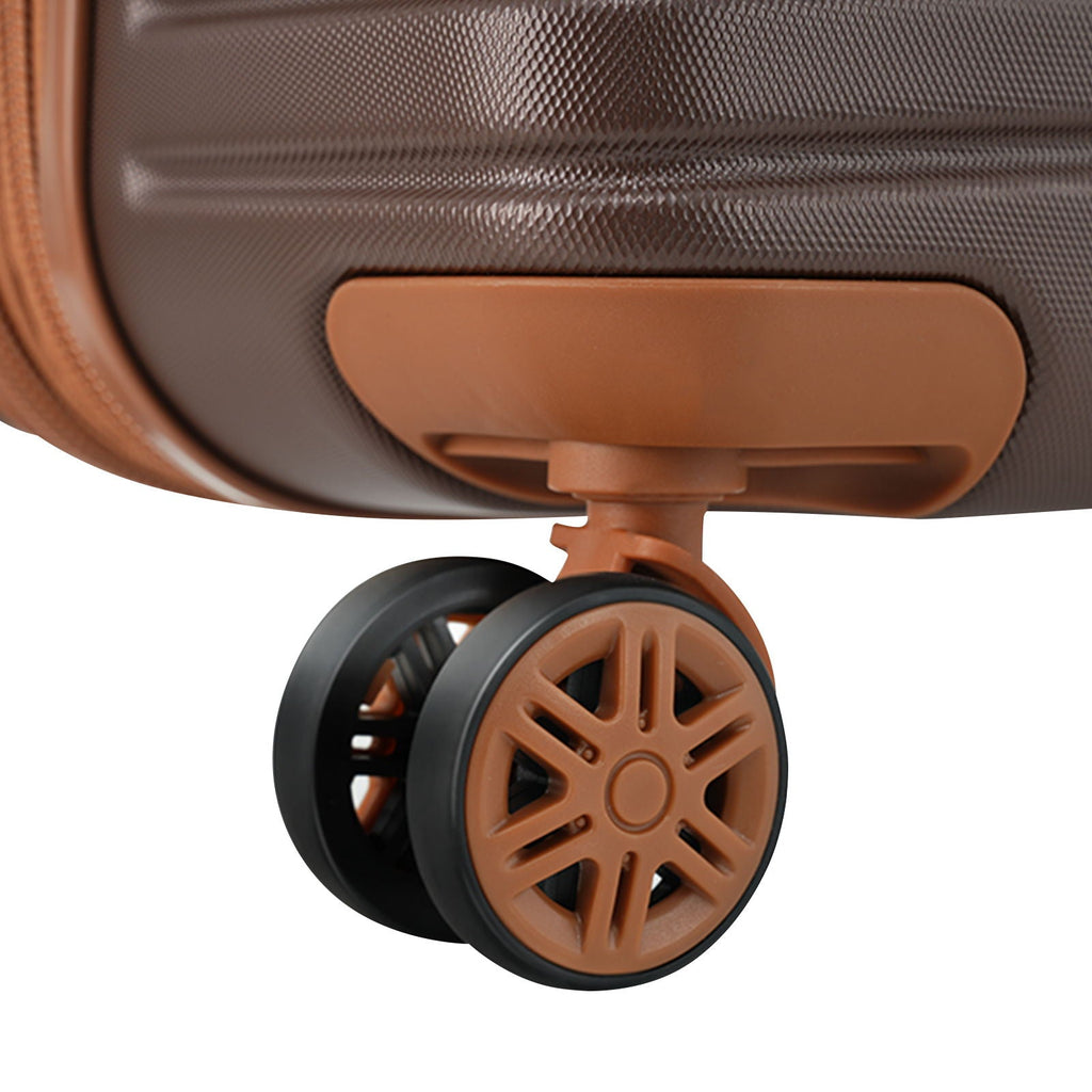 Hard-shell rolling suitcase front wheel and handle panel in dark brown and light gray