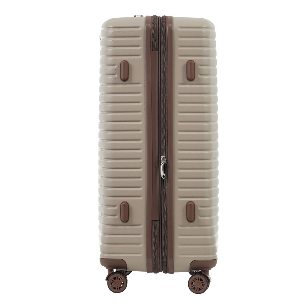 Hard-shell rolling suitcase with beige shell, brown center divider, and side grip pads