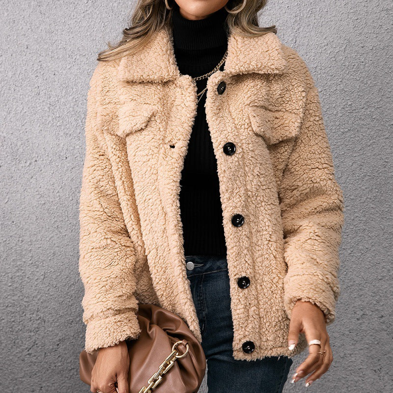 Apricot fleece button-up coat close-up with lapels and front button placket