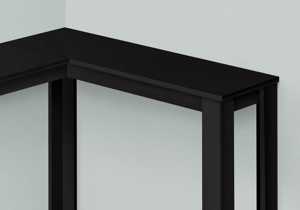 Black corner accent console table top corner close-up with open triangular frame
