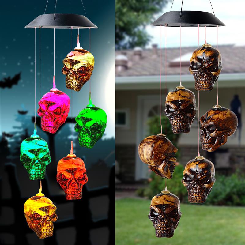 Color-changing solar LED skull wind chime with multicolor glowing skull ornaments