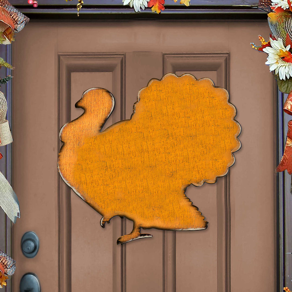 Orange wooden turkey door hanger with scalloped edge and hanging loop