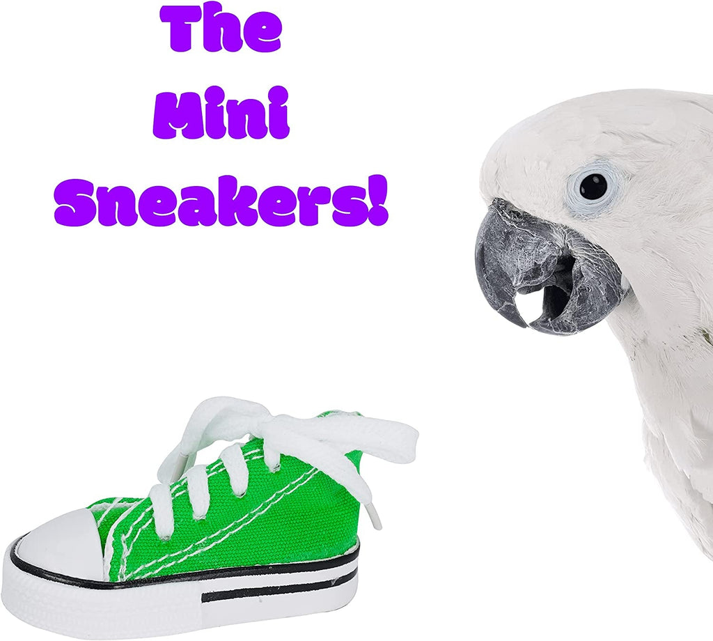 Green mini bird sneaker with white laces and rubber sole