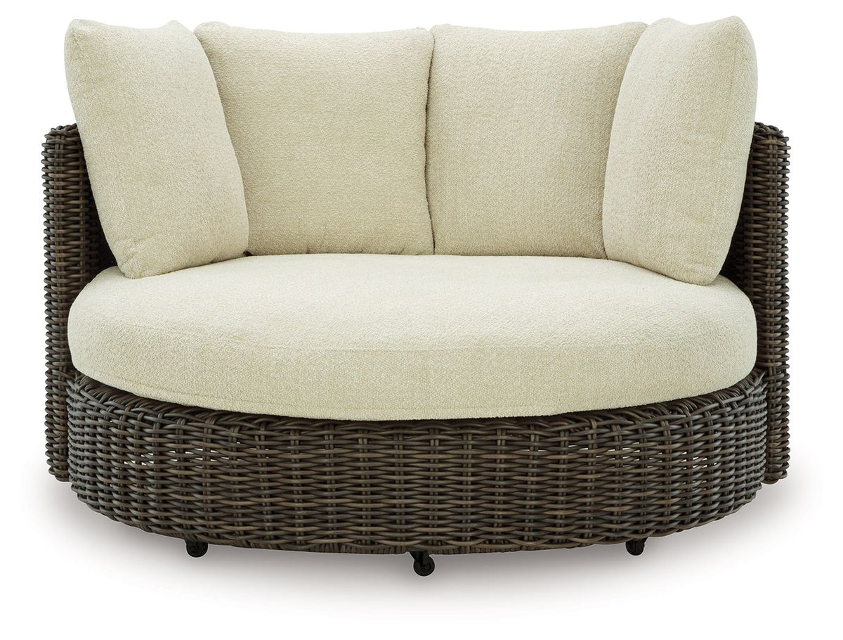 Beige seat and back cushion swivel lounge chair with dark brown wicker frame